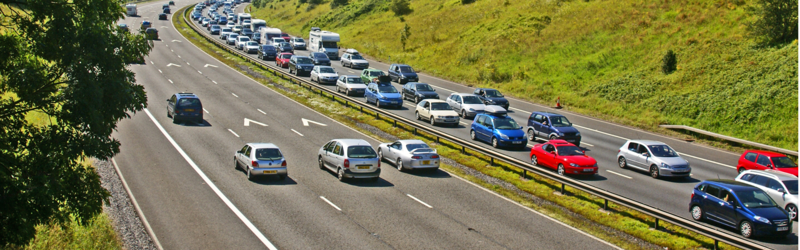 Cars on a motorway on a sunny day